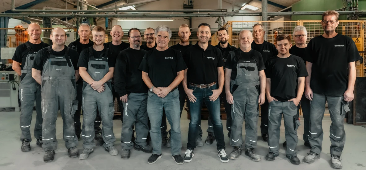 Gastrolux employees standing together on the production floor