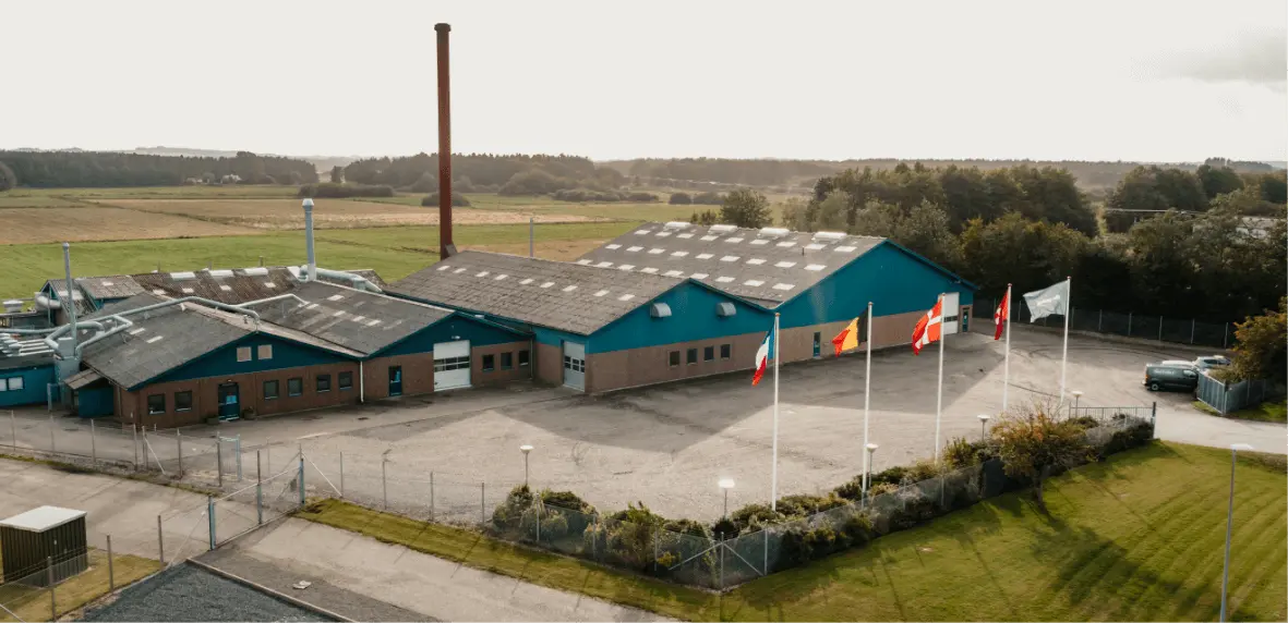 Aerial view of the Gastrolux factory exterior in Ryomgård, Denmark
